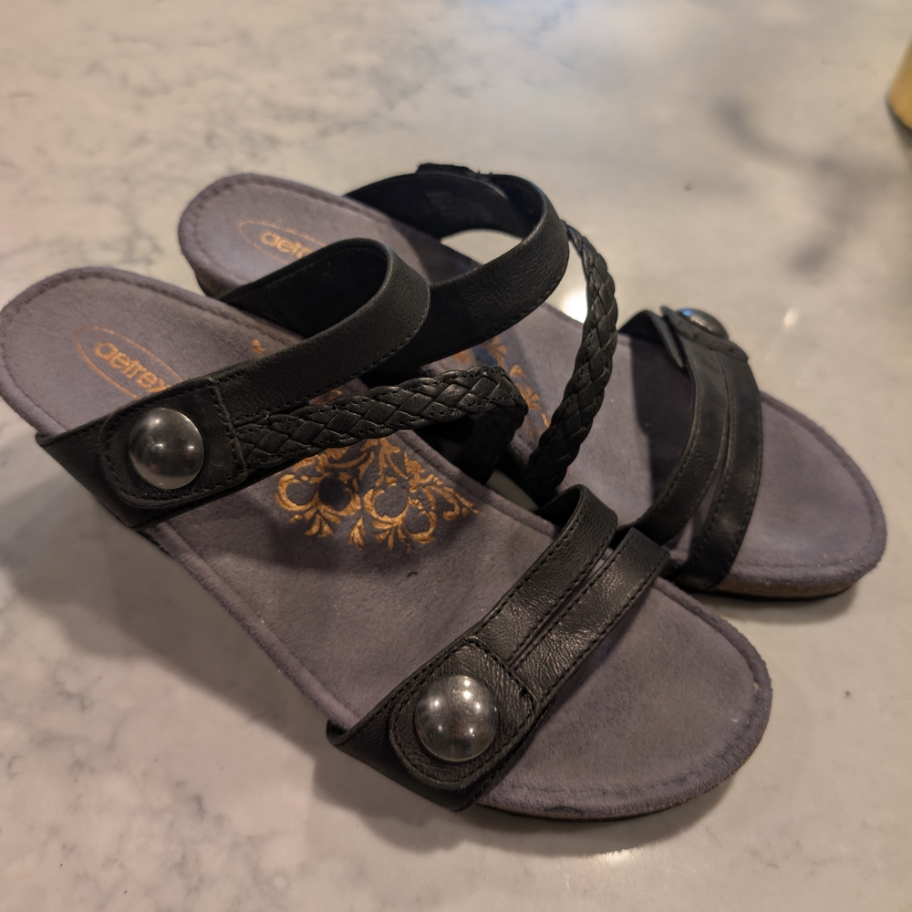 Aetrex EW300W black suede and adjustable wedge sandals.